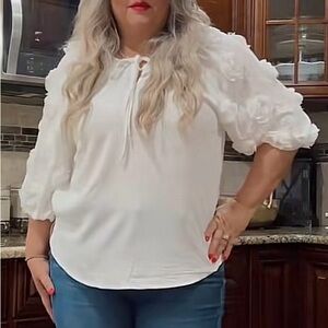 Stylish White Blouse with Rosette Accents